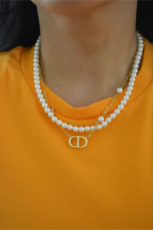 Pearl Necklace by MARO styled for layered jewelry looks