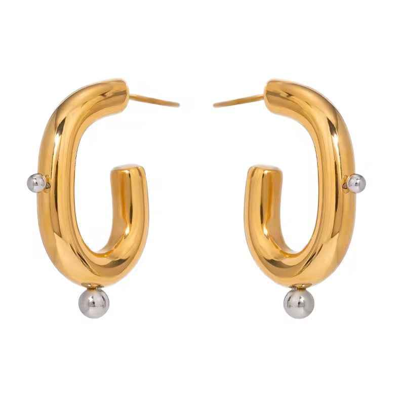 Pair of open oval gold-tone hoop studs with small silver-tone balls on each side