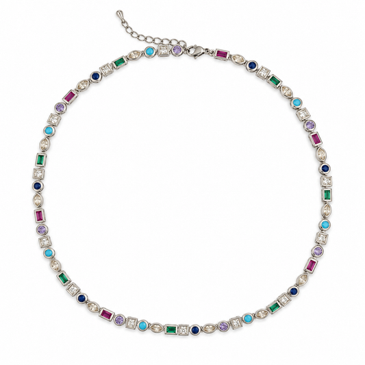 Silver-tone beaded chain with multicolor stones, laid flat on white