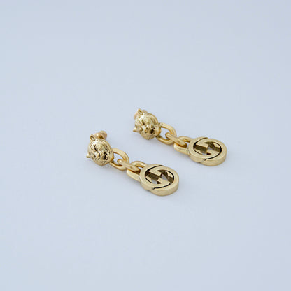 G Gold Earring by MARO, close-up product view