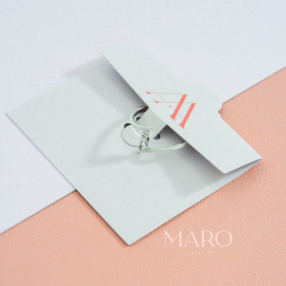 Delicate white ring close-up by MARO Jewelry
