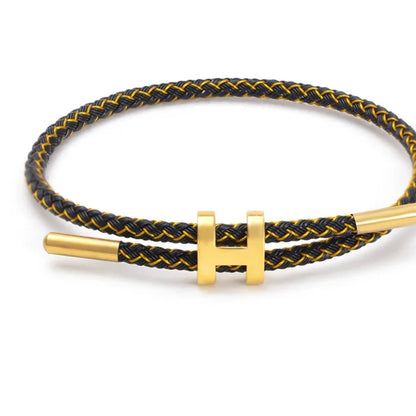 Black and gold Mix & Match Bracelet by MARO JEWELRY – adjustable braided bracelet with gold accent, modern unisex fashion accessory.