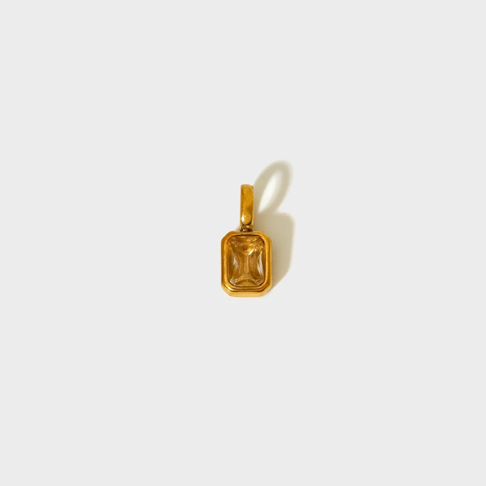 Champagne-tone birthstone charm in a gold-plated rectangular bezel — MARO Jewelry.