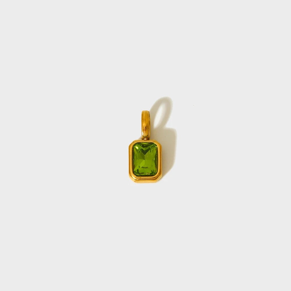 Lime green birthstone charm in a gold-plated rectangular bezel — MARO Jewelry.