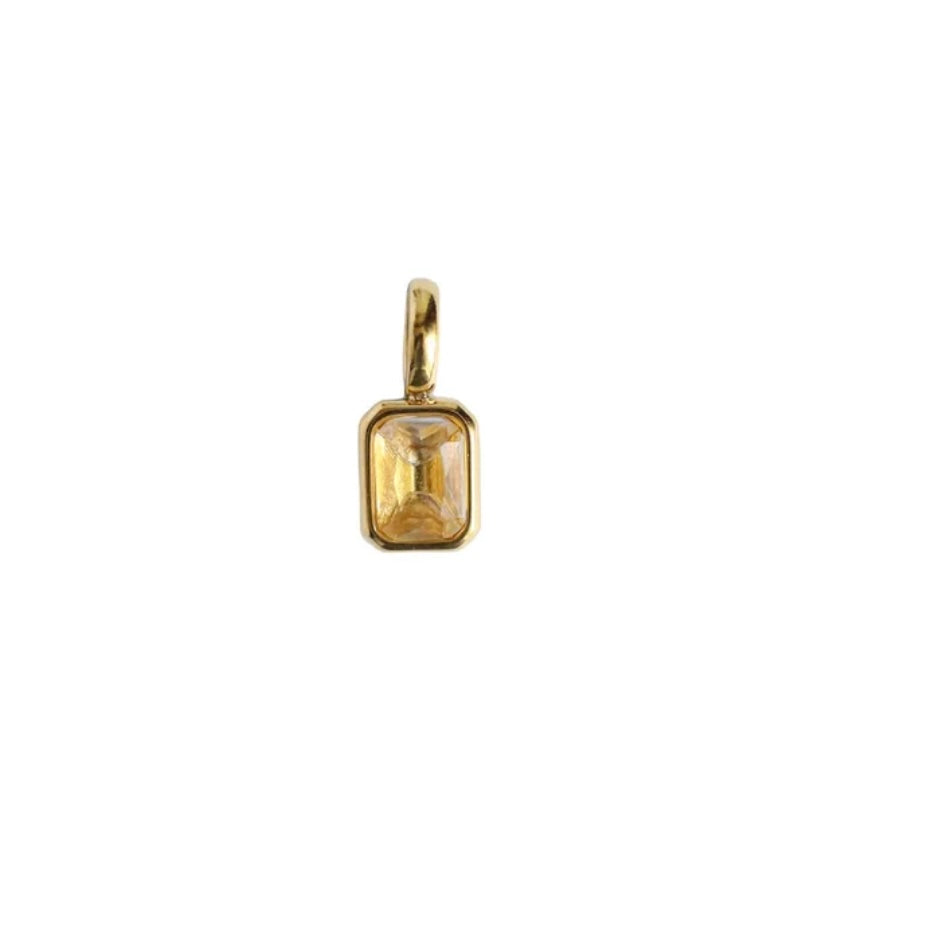 Mauve purple birthstone charm in a gold-plated rectangular bezel — MARO Jewelry.