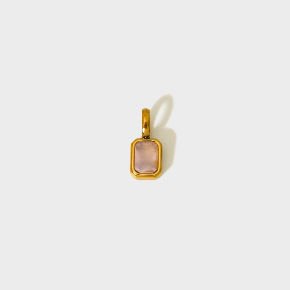 Soft pink birthstone charm in a gold-plated rectangular bezel — MARO Jewelry.