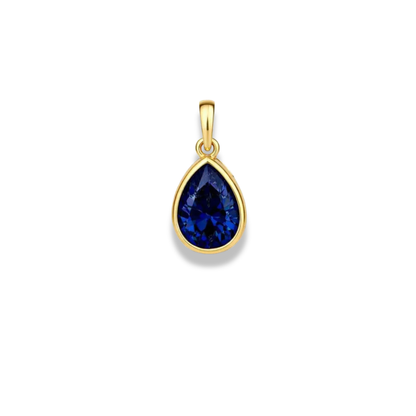 Dije de piedra azul profundo en forma de gota con engaste en tono dorado y una pequeña argolla, sobre fondo blanco