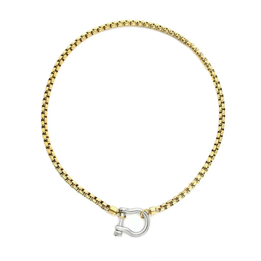 Gold-tone box chain necklace with a silver-tone horseshoe-shaped closure