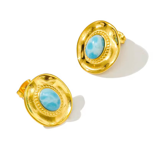 Pair of gold-tone disc stud earrings with oval turquoise stones and beaded rims