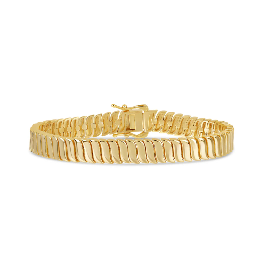 Gold-tone bracelet of polished wave-shaped links with a box clasp, flat on white