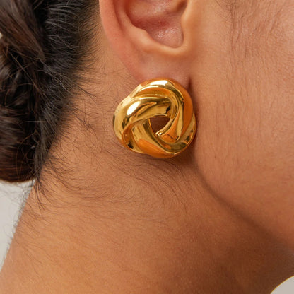 Knot Stud Earrings in gold — polished minimalist design symbolizing love and connection, waterproof and hypoallergenic jewelry by MARO.