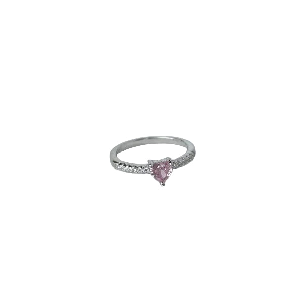Slim silver-tone ring with a pink heart-shaped stone and tiny clear stones along the sides, on white