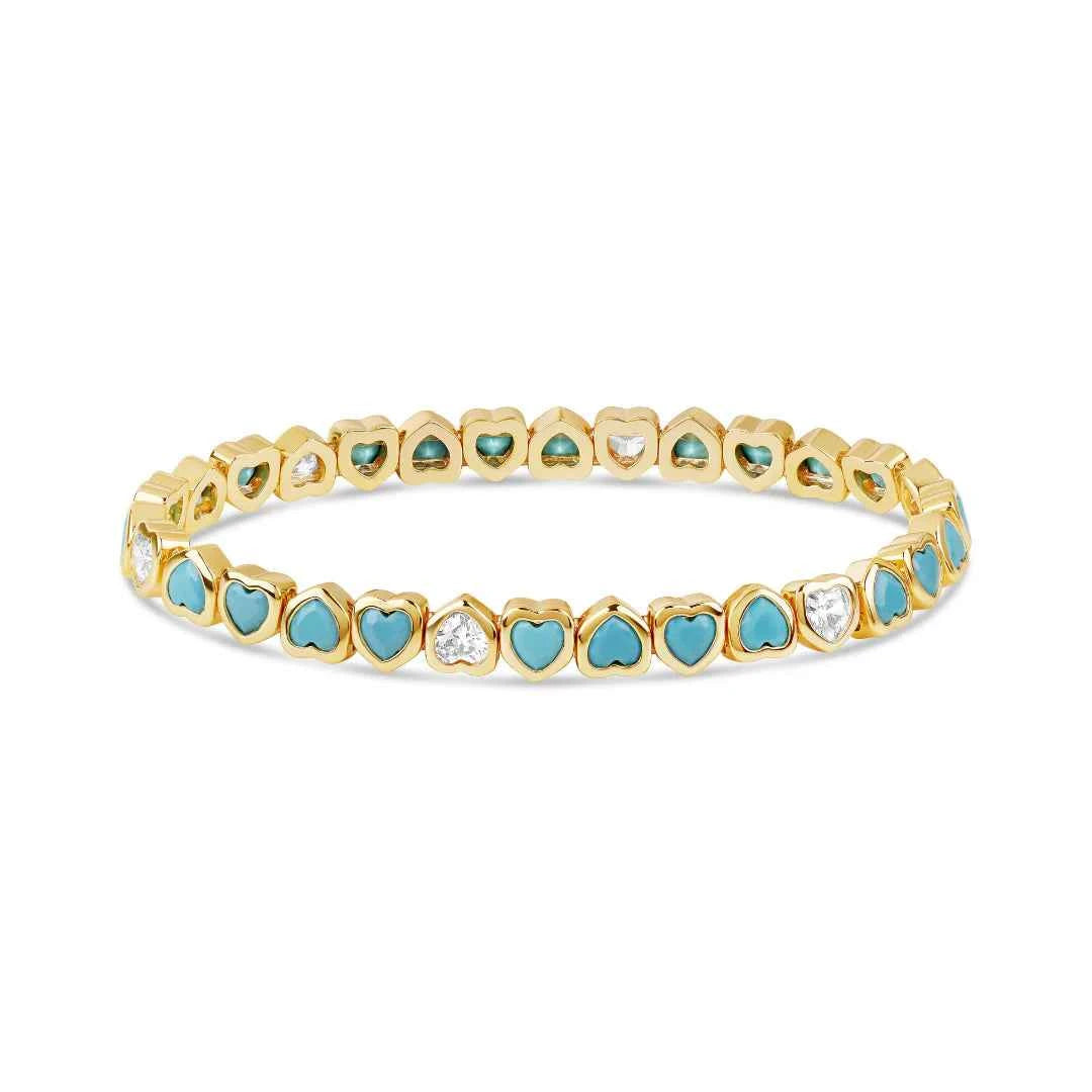Stretch bracelet of tiny turquoise-blue heart stones and a few clear ones in gold-tone frames