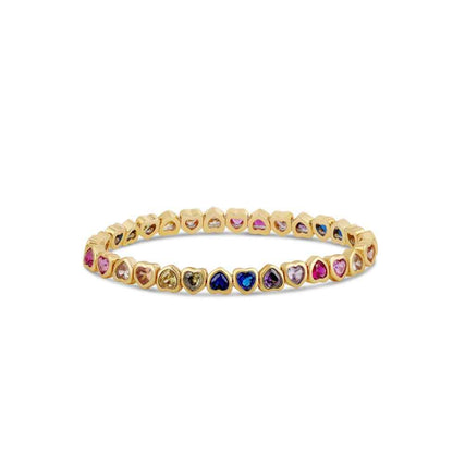 Stretch bracelet of tiny multicolor heart-shaped stones in gold-tone frames, flat on white