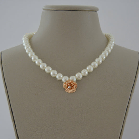 Elegant pearl necklace with gold flower charm centerpiece — MARO Jewelry