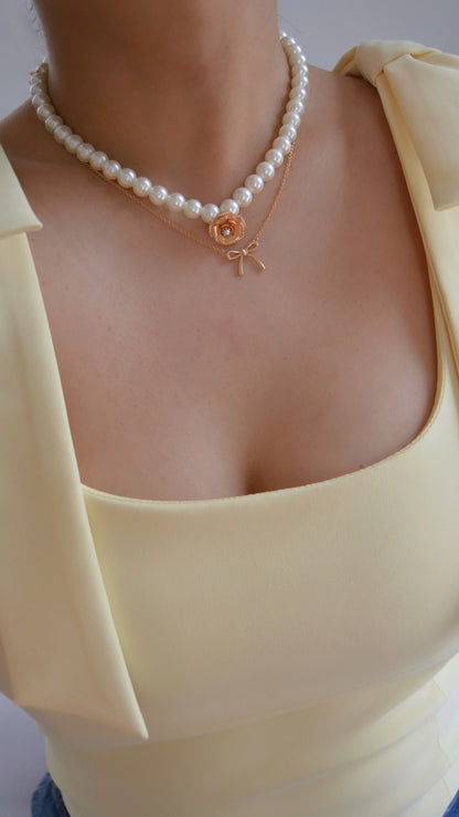 Pearl Necklace layered with pendant necklace by MARO