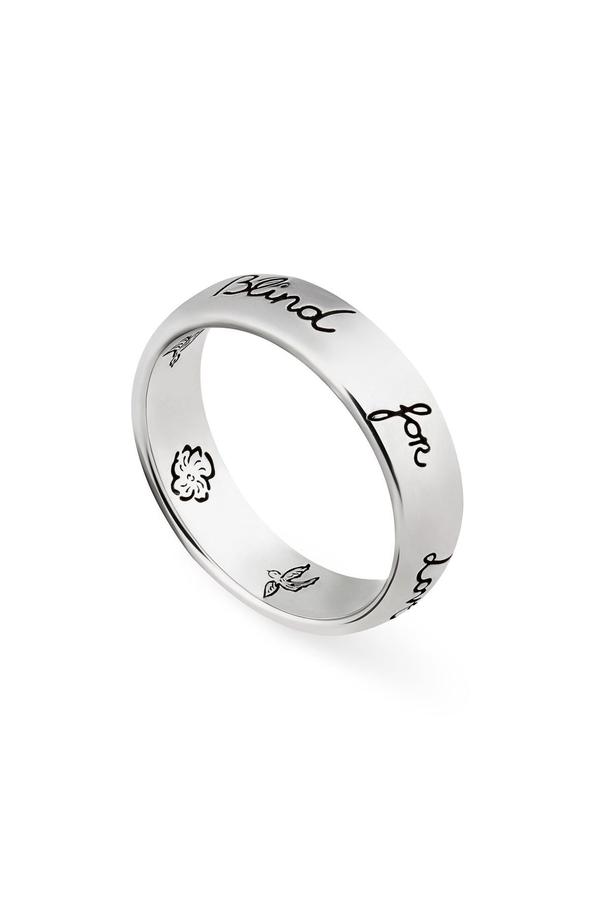 Silver-tone band with engraved handwritten-style lettering and a small flower motif, three-quarter view