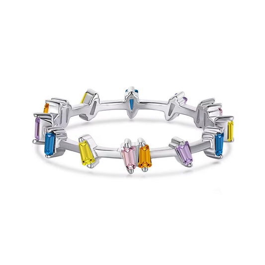Thin silver-tone ring with multicolor baguette-cut stones spaced around the band