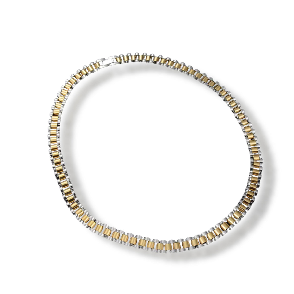 Two-tone watch-link chain necklace laid in a loop