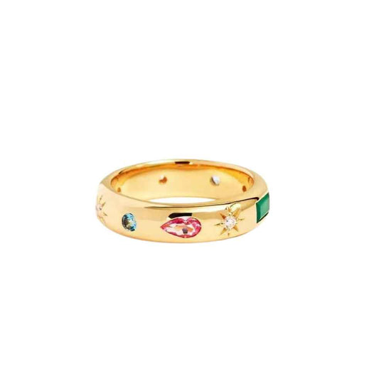 Wide gold-tone ring set with pink, green and blue stones and small star details