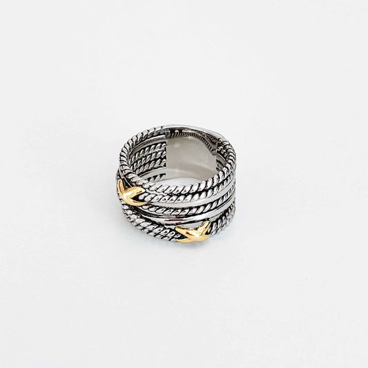 Wide multi-band twisted ring in antiqued silver-tone with small gold-tone X accents, front view