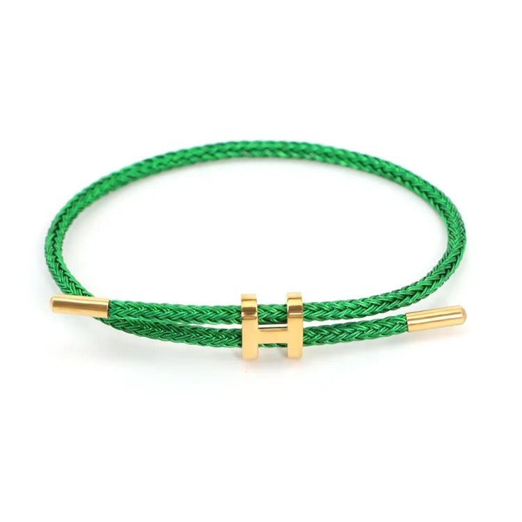 stylish braided green bracelet for men gold accent