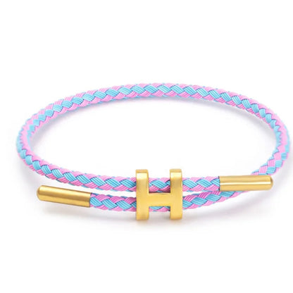 Pink and blue Mix & Match Bracelet by MARO JEWELRY – adjustable braided bracelet with gold accent, playful and versatile unisex accessory.