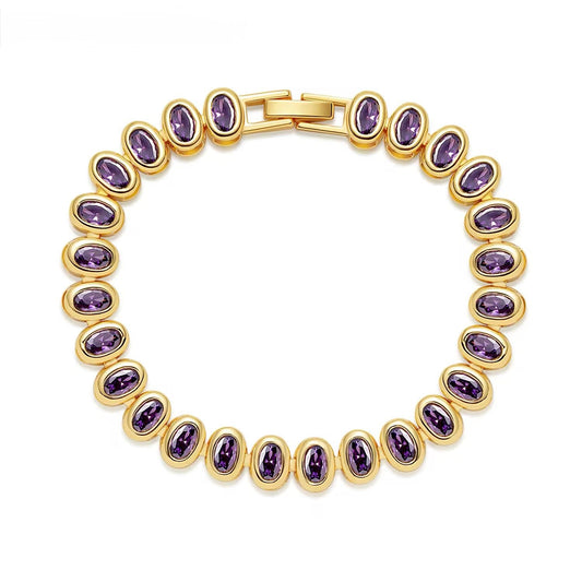 Pulsera estilo tenis de oro con eslabones de circones morados (púrpura) de corte ovalado. Brazalete elegante y de lujo.