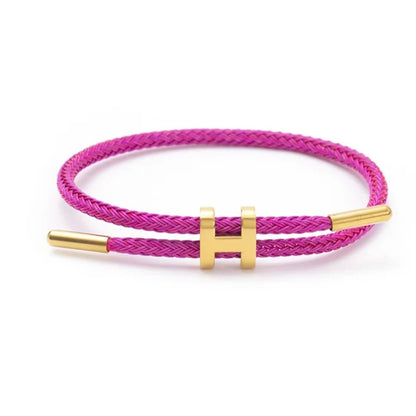Men's braided pink rope bracelet with gold H letter clasp, fashionable and elegant men's accessory